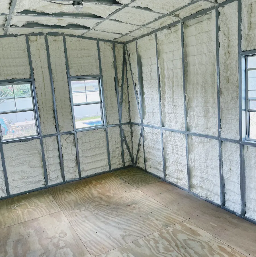 Closed-cell spray foam insulation applied to wall cavities in a residential project in Chesterfield